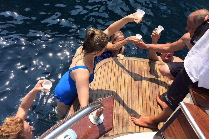 Capri Island Small Group Boat Tour from Rome by Train - From Sorrento to Capri: Boat Views and Grottos in Real Time