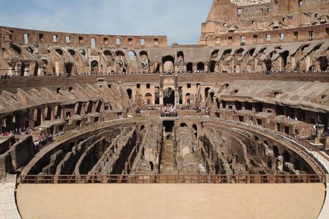 Colosseum Group Tour with Roman Forum and Palatine Hill - Entering The Colosseum: First Floor to Upper Level Views