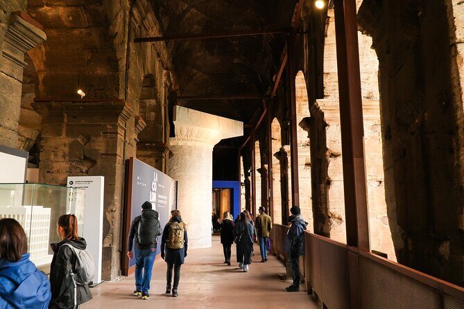 Colosseum Guided Tour and Self-Guided Roman Forum Visit - Entering the Colosseum Through the Gates of Ancient Rome
