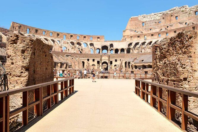 Colosseum, Roman Forum and Palatine Hill Skip Line Private Tour - The Arena Moment: Gladiator Doors and the Floor Meaning