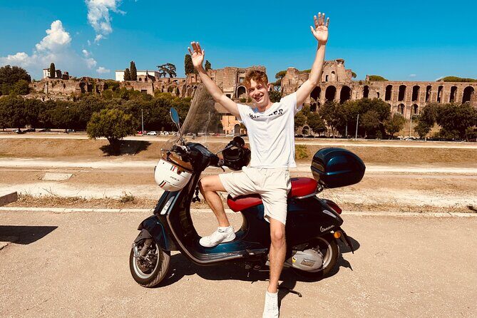 English: Vespa Tour Rome- Experience like a Roman - Colosseum Outside Views, Circo Massimo, and Piramide Cestia: The Drive-by Lesson