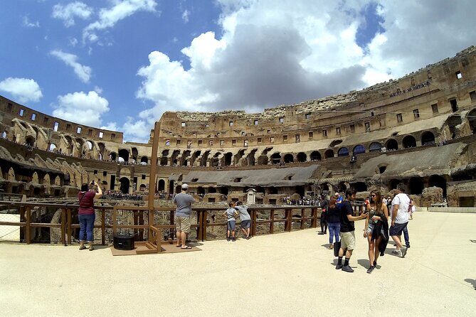 Exclusive Tour Colosseum Arena with Archaeologist & Roman Forum - Colosseum Stop: Arena Floor Views and the Stories Behind the Stones
