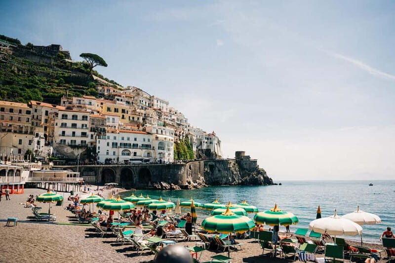 From Rome: Sorrento, Positano & Amalfi Coast Day Trip - Positano: guided orientation, shop strolls, and real swim time