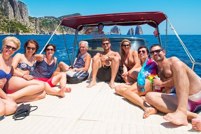 Full day Capri Island Small Group Boat Tour from Naples - The Capri boat route: White Grotta, Natural Arch, Faraglioni, and Grotta Verde