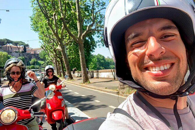 Guided Vespa Tour of Rome – Ride a Vespa with a Local Guide - Rione Monti: helmets on, then Rome’s real streets