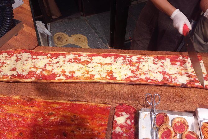 Jewish Ghetto and Campo Dè Fiori By Night Food, Wine and Sightseeing Tour - Piazza Navona dessert and the Bernini–Borromini effect