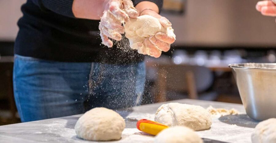 Naples: Authentic Neapolitan Pizza Making Class - Learning the dough stretch like a Neapolitan pro