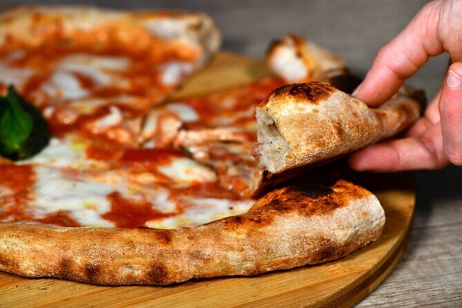 Naples: Pizza and Beyond Food Tour by Do Eat Better - Stop 3 in Piazzetta Nilo: pizza fritta (handheld fried pizza)