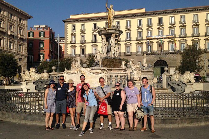 Naples Street Food Experience with local guide - Small Group Tour - Castel Nuovo and Via San Carlo: the walk turns from streets to spectacle