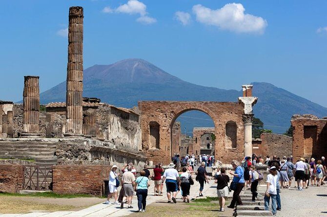 Pompeii and Herculaneum led by an Archaeologist with private transport - Pickup and private Mercedes-style transport across Campania