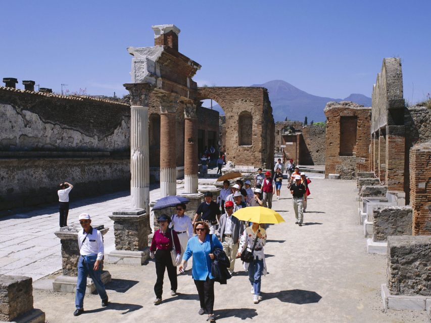 Pompeii and Herculaneum: Private Tour with Transportation - Pompeii’s western route: forums, baths, a brothel, and the street-level details