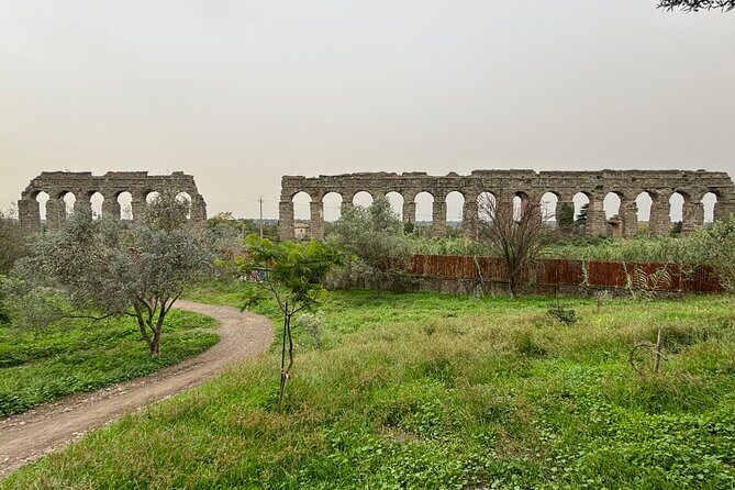 Private E-bike tour of Appian way, Aqueduct & catacombs with food - Parco degli Acquedotti: Aqueduct Arches, Open Air, and a Change of Pace