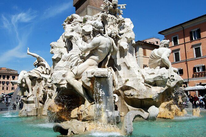 Private Golf Cart Tour of the Eternal City - Piazza Venezia and Largo di Torre Argentina: monuments, power, and cats