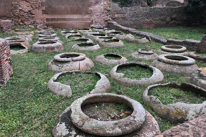Private tour of Ostia, the ancient city harbor, by van with a PhD archaeologist - Decumanus and Warehouses: Reading the Port City Economy