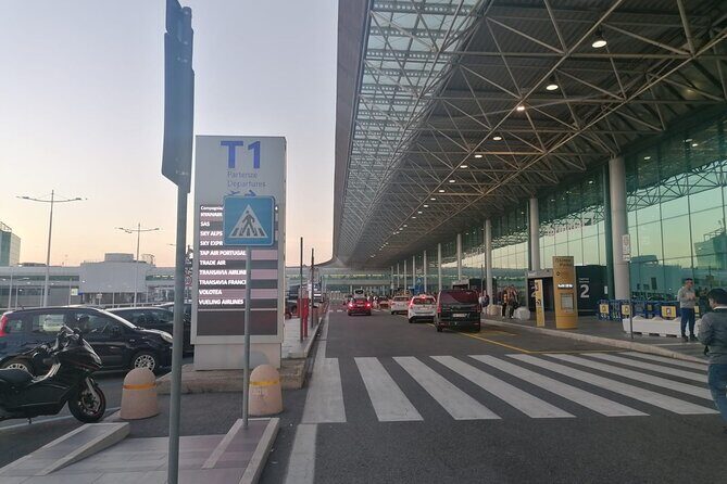 Private transport from Fiumicino Airport to Rome City or vice versa - Comfort on board: AC, Wi‑Fi, and water for the ride into Rome