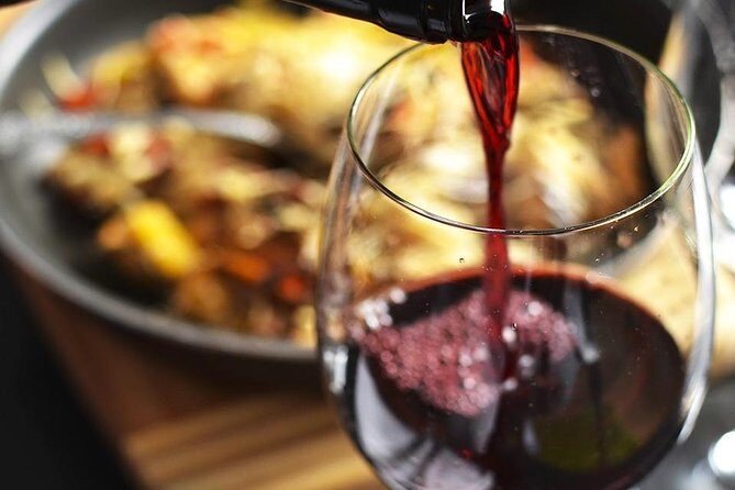 Private Wine Tasting in Rome with Delectable Meats and Cheeses - Enoteca Bortone: the cozy room (and the street factor)