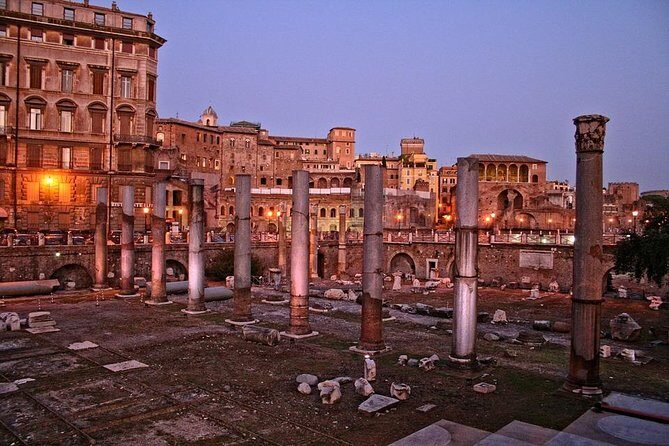 Roman Nightscape: Exclusive Private Night Tour with Driver - Piazza Navona after dark: Roman stadium bones in a lively square
