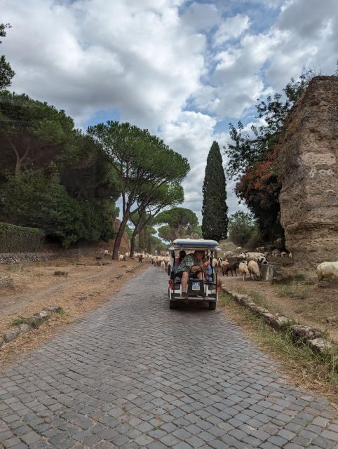 Rome: Appian Way & Catacombs Golf Cart Shared Tour - Tomb of Cecilia Metella and Capo di Bove: power on display