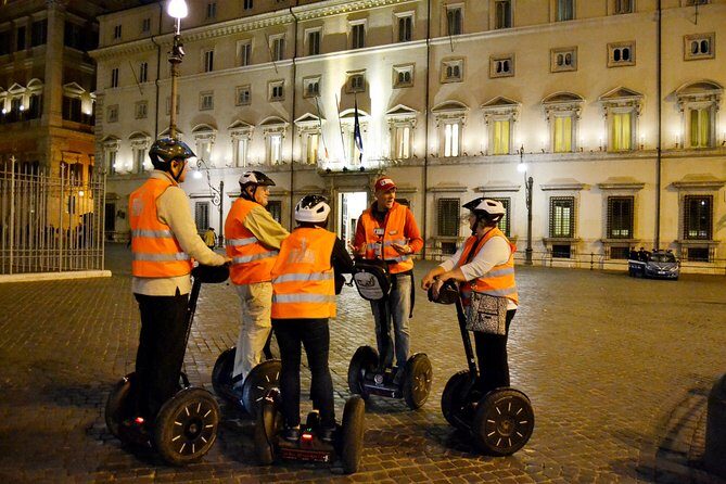 Rome at Night Segway Small Group Tour - Trevi Fountain glowing at night: the most famous stop, handled with care