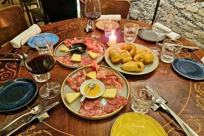 Rome: Caravaggio Experience with Light Lunch and Wine Tasting - The wine lineup: white, red, and dessert with real pairing logic