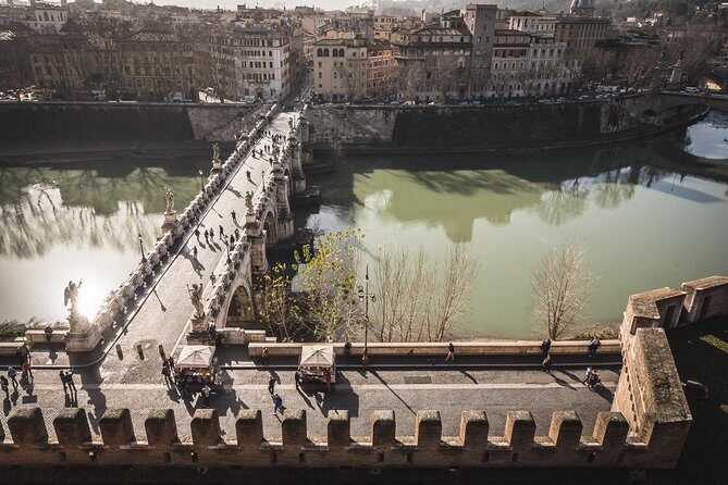 Rome: Castel Sant'Angelo Entry Ticket & Express Panoramic Tour - Small group, live guide, and the sound of headsets working