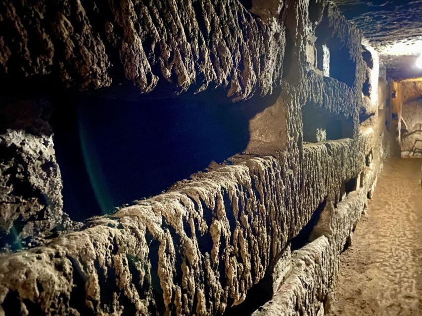 Rome: Catacombs & St Clement's Underground Semi-Private Tour - The Mithraic Temple and the underground stream: pagan Rome under Christian Rome