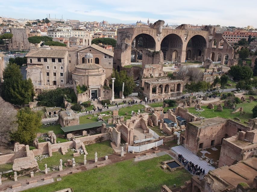 Rome: Colosseum Arena Floor, Roman Forum & Palatine Tour - Entering the Colosseum from the Arch of Constantine