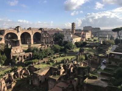 Rome: Colosseum, Forum, and Palatine Hill Guided Tour - Colosseum Time: Reconstructions, Gladiator Gear, and a Crowd in Your Head