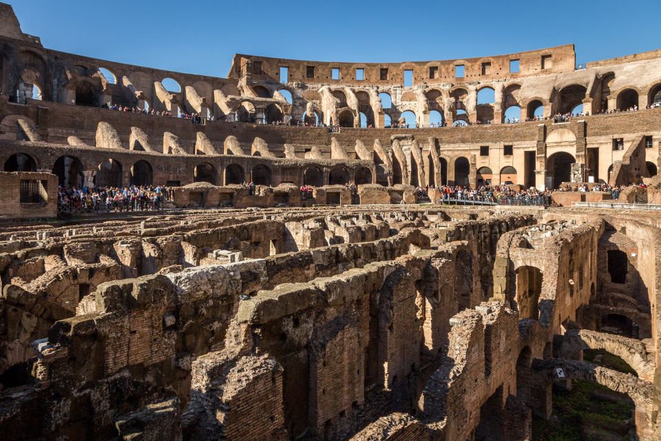 Rome: Colosseum, Forum and Palatine Hill Private Guided Tour - Roman Forum on the Via Sacra: where power looked normal