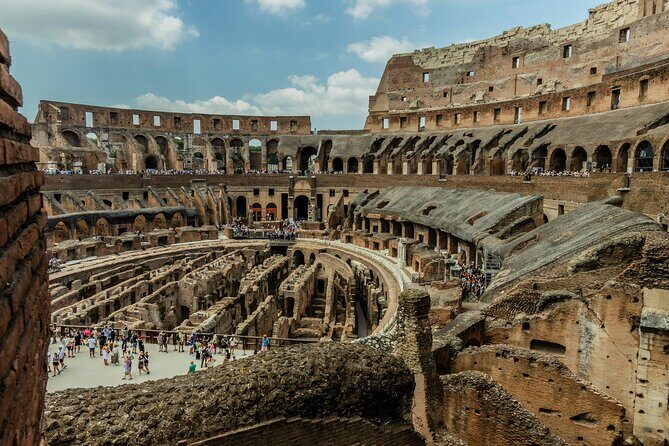 Rome Colosseum, Roman Forum & Palatine Hill Audio Tour - Entering the Colosseum: arena views, hypogeum story, and best-photo levels