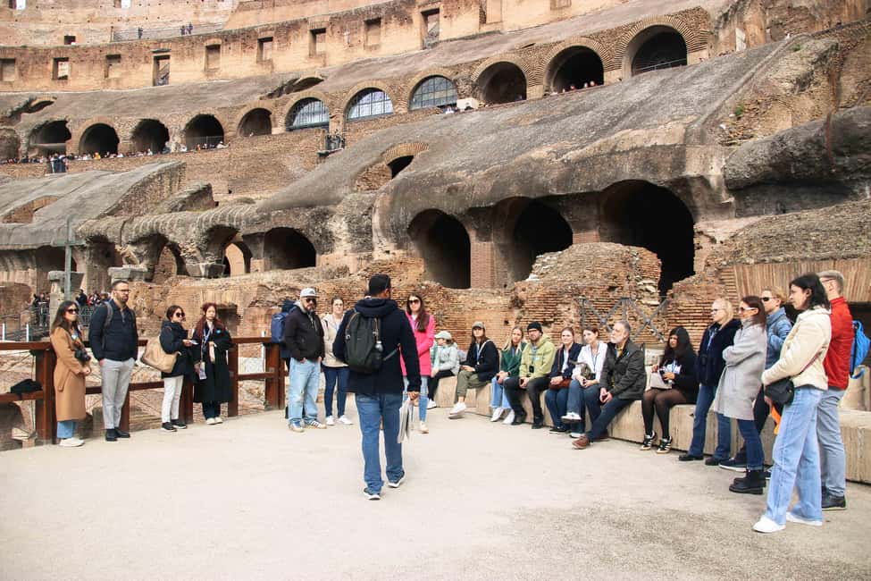 Rome: Colosseum, Roman Forum & Palatine Hill Guided Tour - Starting at the Colosseum: Stairs, Arches, and Gladiator Stories