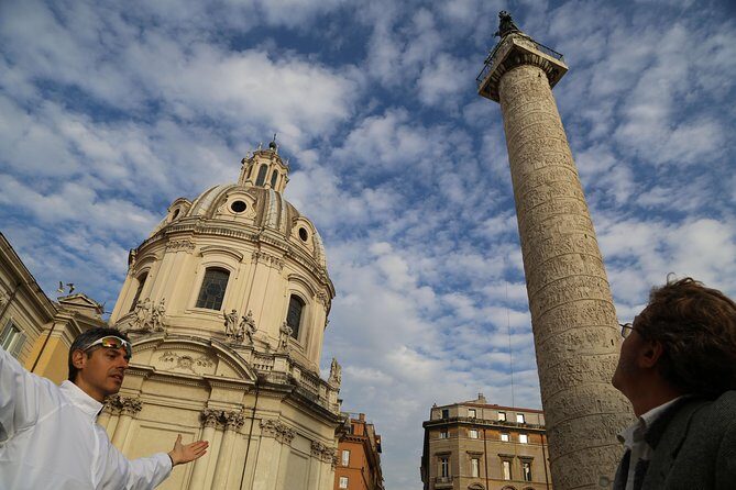 Rome E-Bike Tour – Premium Small Group with Local Guide - The huge square, the wedding-cake monument, and Trajan’s legacy