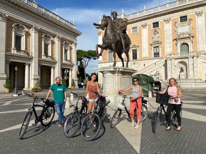 Rome: E-Bike Tour with Locals in German language - Testaccio and the pyramid: swapping postcards for neighborhood intrigue