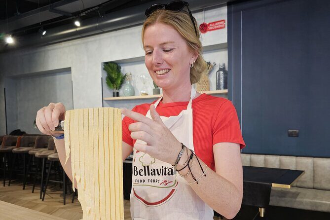 Rome: Hands-on Fettuccine, Ravioli & Tiramisu Cooking Class - Making fettuccine in a hands-on way (not just rolling it)