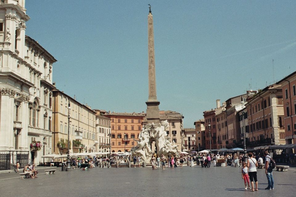 Rome Highlights Private Tour From Civitavecchia Port - Entering Ancient Rome: Roman Forum, Colosseum, and the Palatine View