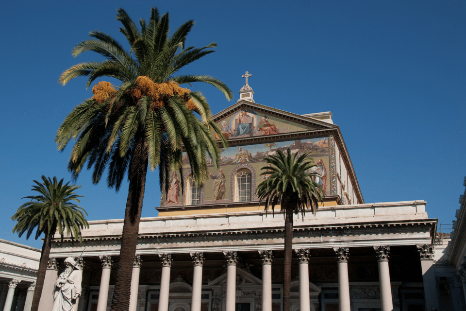 Rome: Holy Doors Pilgrimage with Private Driver and Guide - San Paolo fuori le Mura: The Cloister Calm and Mosaic Interior