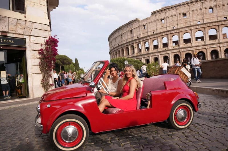 Rome in a Fiat Jolly: Exclusive Vintage Ride & Photo Tour - Cruising near the Colosseum on an open-top Fiat Jolly