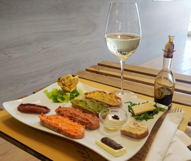 Rome: Italian Food and Wine Guided Tasting Experience - Stop Two: Truffle Pate, Asiago, Olive Oil, and Pesto Genovese