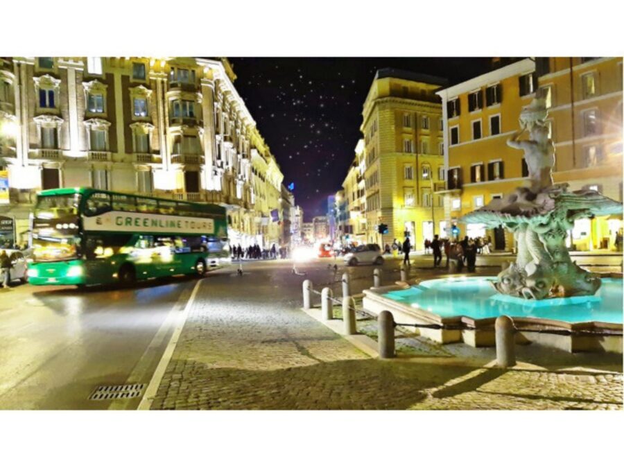 Rome: Nighttime Tour by Open-Top Bus with Tasting Stop - Audio guide, hostesses, and staying comfortable on an open-top deck