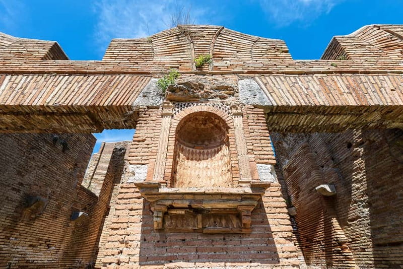 Rome: Ostia Antica Archaeological Park Ticket & Audio App - The Villas of Procoio: baths, theater, and stone masks