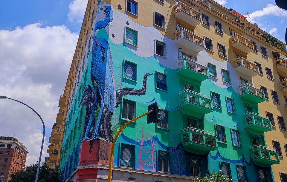 Rome: Ostiense Graffiti and Modern Street Art Walking Tour - Heading Down Via Ostiense: Where Posters and Stickers Take Over