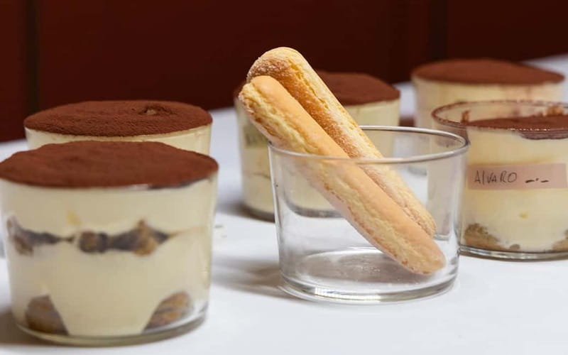 Rome: Pizza and Tiramisù Cooking Class with Glass of Wine - The Meal: Wine, Limoncello, and Eating With Your Group
