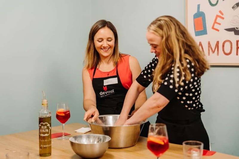 Rome: Pizza Making Class with Gelato & Drinks Included - Topping, baking, and eating your pizza like a Roman
