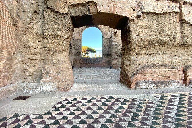 Rome: Small-Group Tour of Caracalla Baths and Circus Maximus - Mosaics, geometry, and the visual language of the baths