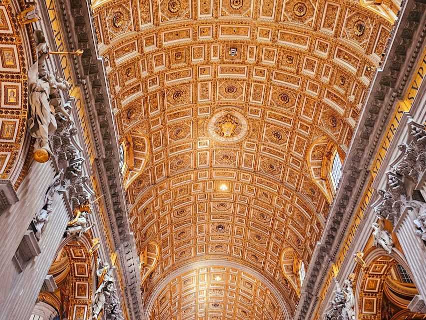 Rome: St. Peter's Basilica and Papal Tombs Guided Tour - Entering St. Peter’s Basilica: La Pietà, Bernini’s Baldachin, and the marble rhythm