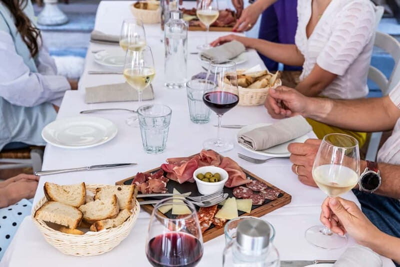 Rome: Taste of Testaccio Food & Market Tour - Cheese, cured meats, and wines that make Roman food click