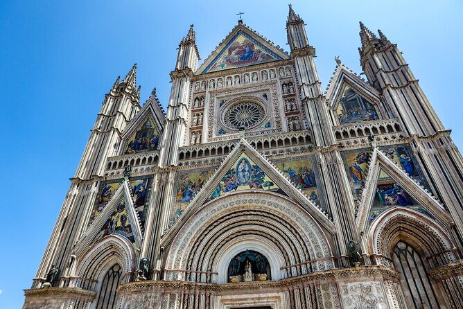 Rome to Orvieto Day Trip by Train with Duomo, Caves and Lunch - Old town time: Piazza del Popolo, Palazzo Faina, Torre dei Sette