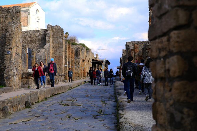Rome to Pompeii & Herculaneum Trip with Hotel Pickup & Skip-the-line Tickets - Chiesa di Sant’Ercolano and Herculaneum in Two Hours: Where the Visuals Hit Hard