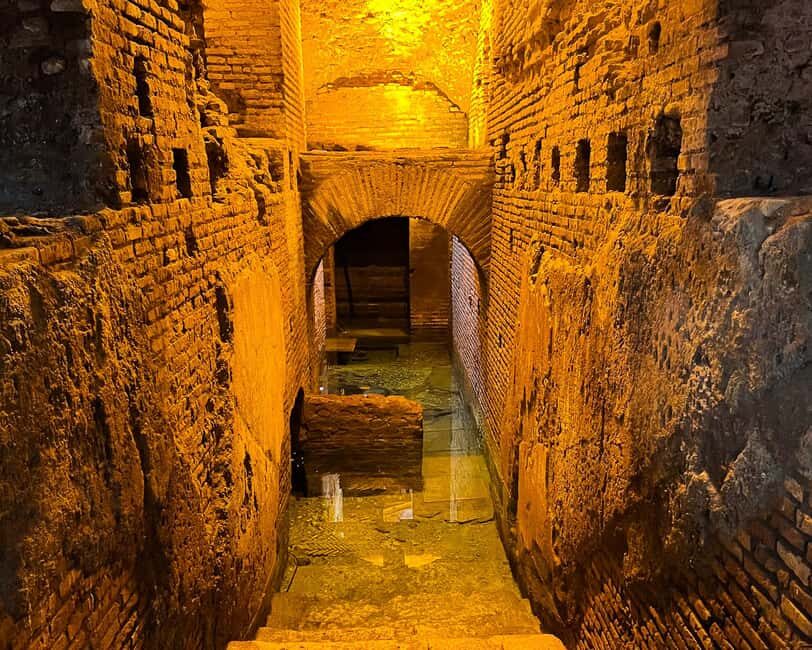 Rome: Trevi Fountain Underground Aqueduct Walking Tour - Following the aqueduct through streets, shops, and surprising ruins