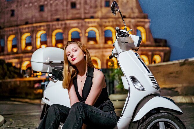 Rome Vespa Small Group Tour with Photoshoot - Colosseum area stop: the big picture first, then the details